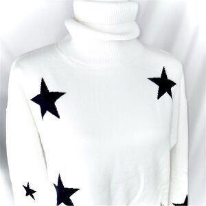 White Turtleneck Sweater with Black Star Accents